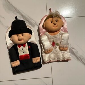 Vintage bride and groom oven mits